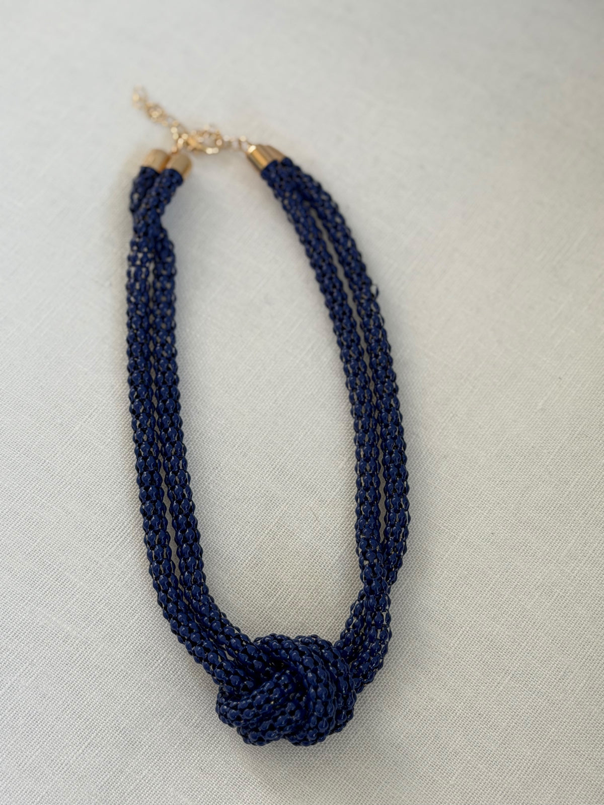 Colgante azul nudo