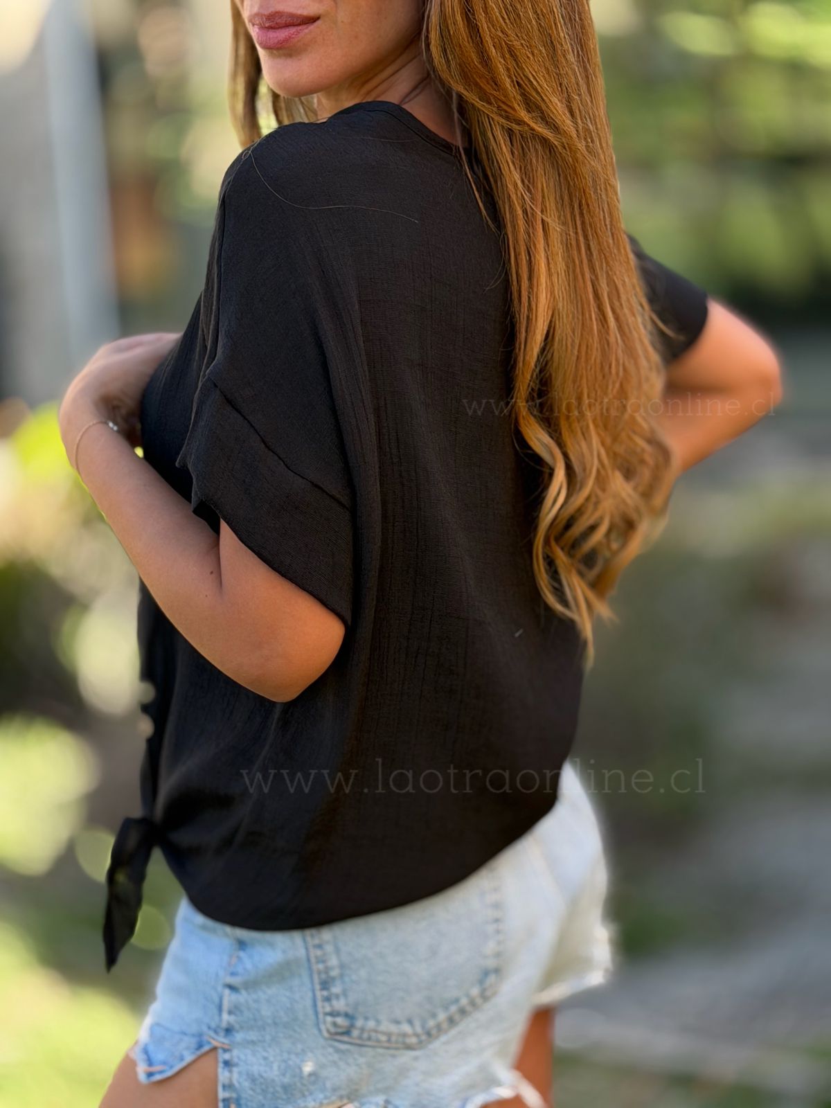 Polera Nudo botones negro