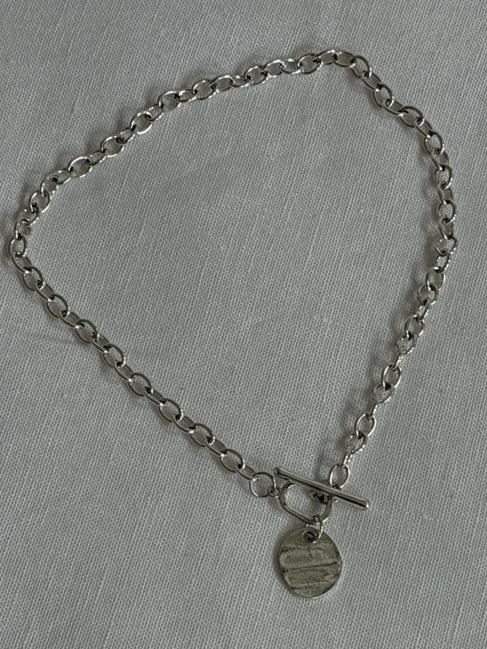 Colgante timón plata