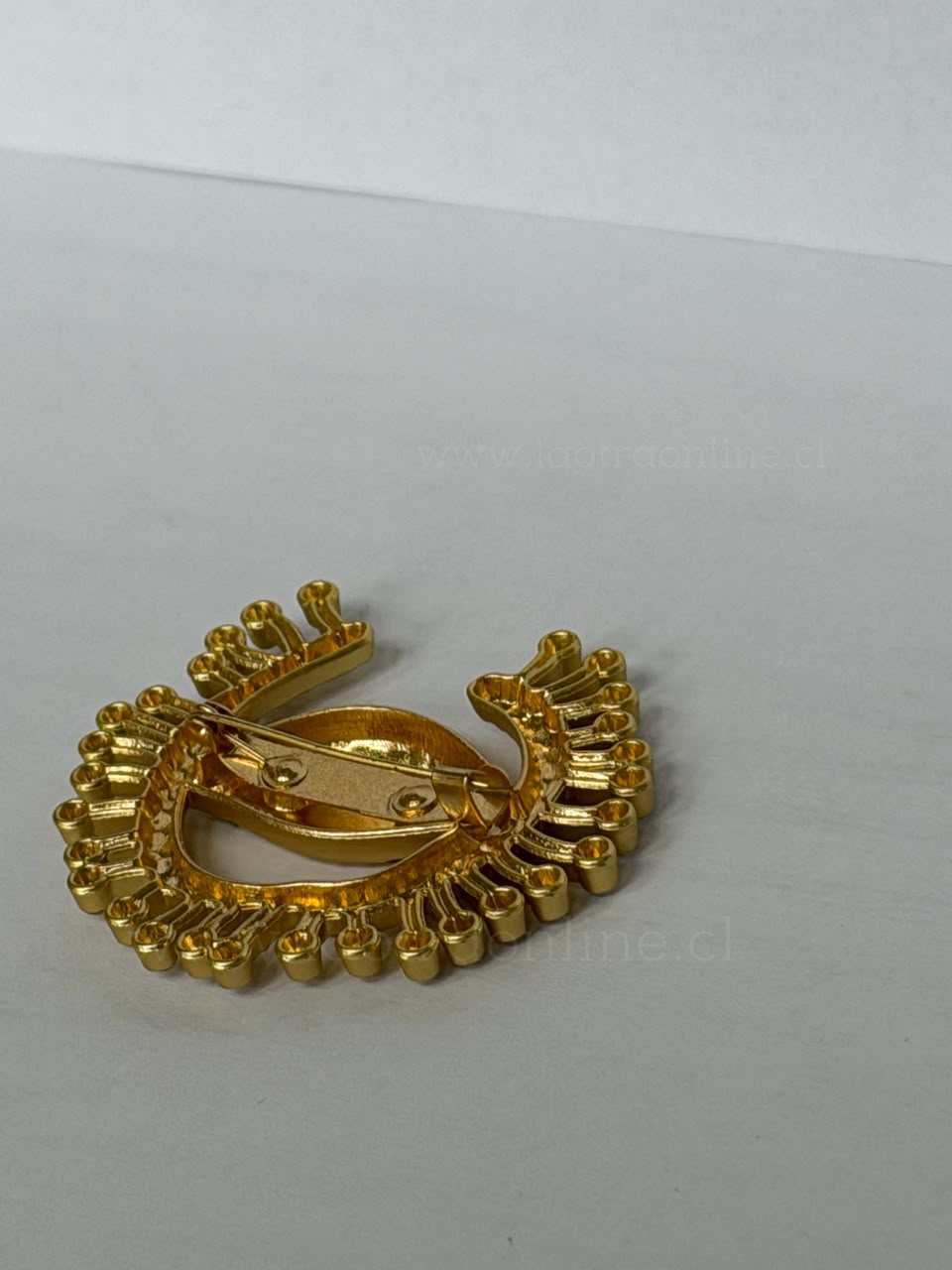 Prendedor Ojo dorado