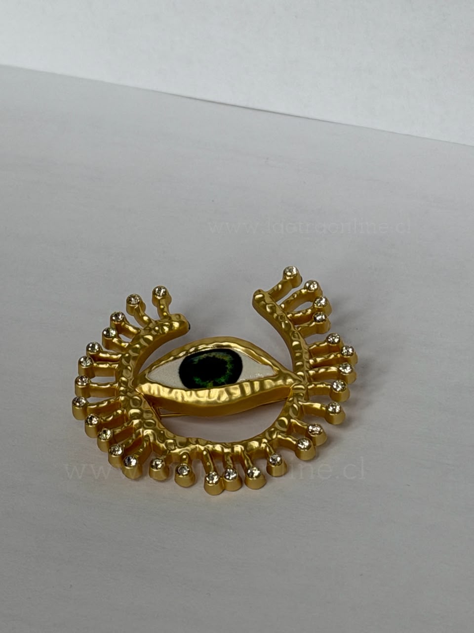 Prendedor Ojo dorado