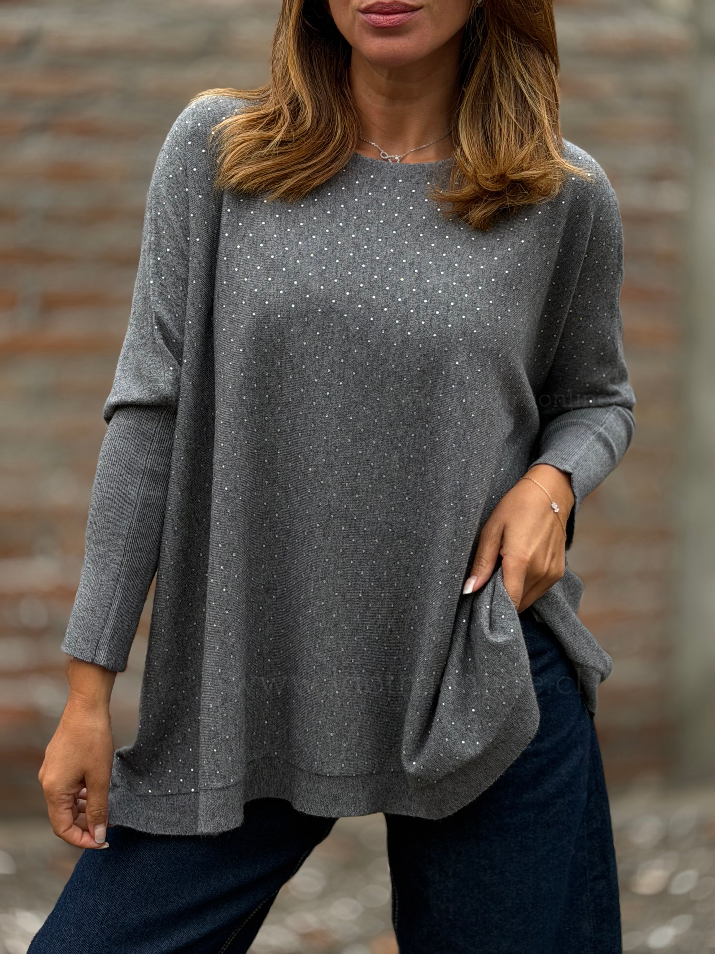 Sweater tachitas acero