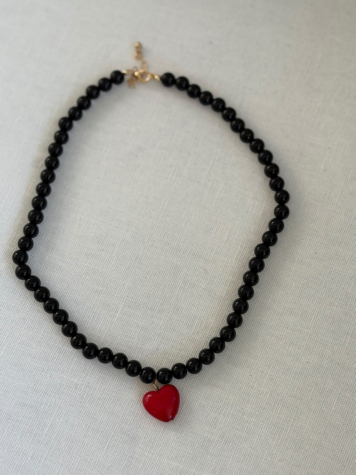 Colgante perla corazón rojo
