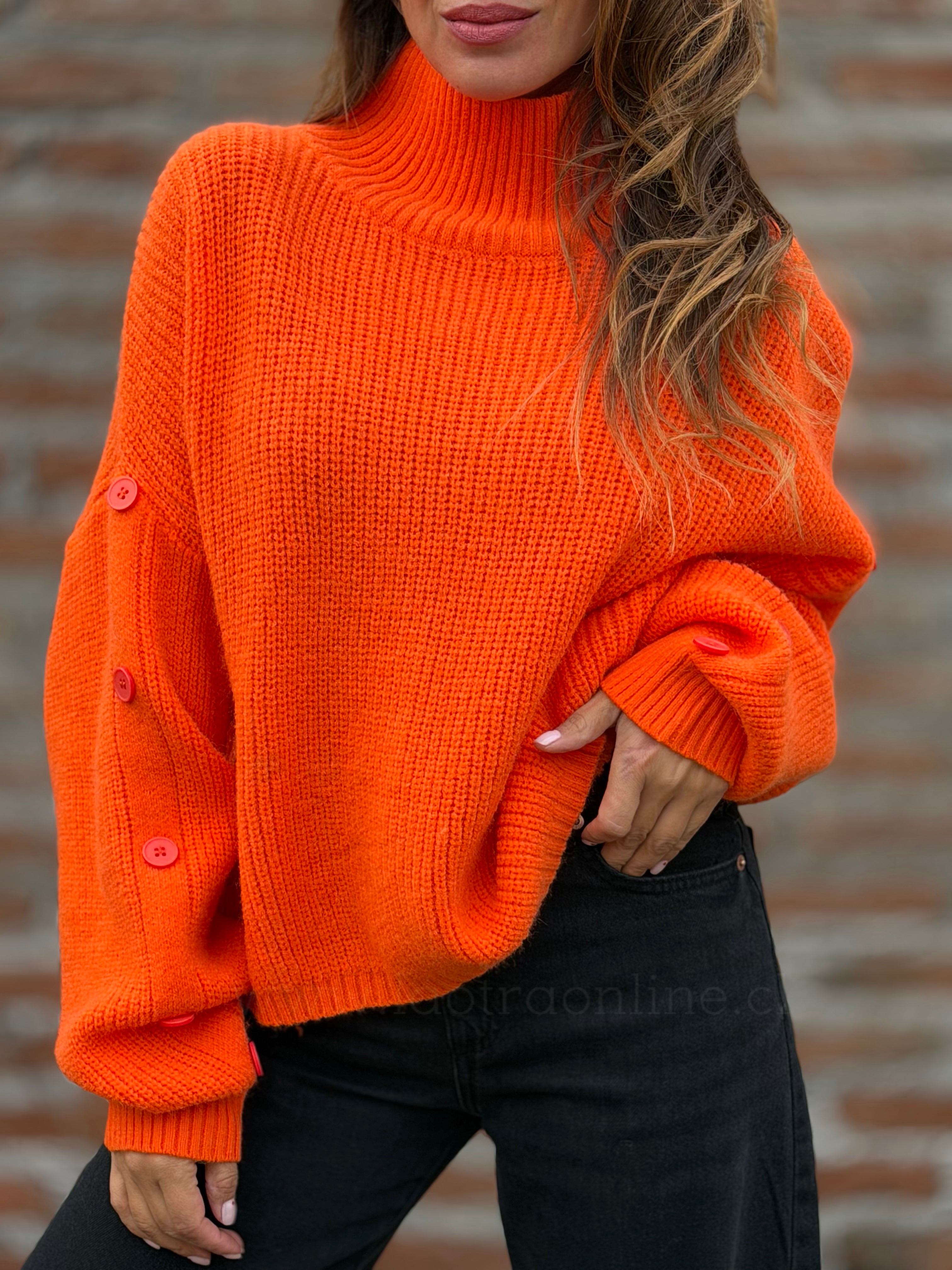 Sweater manga botón naranja