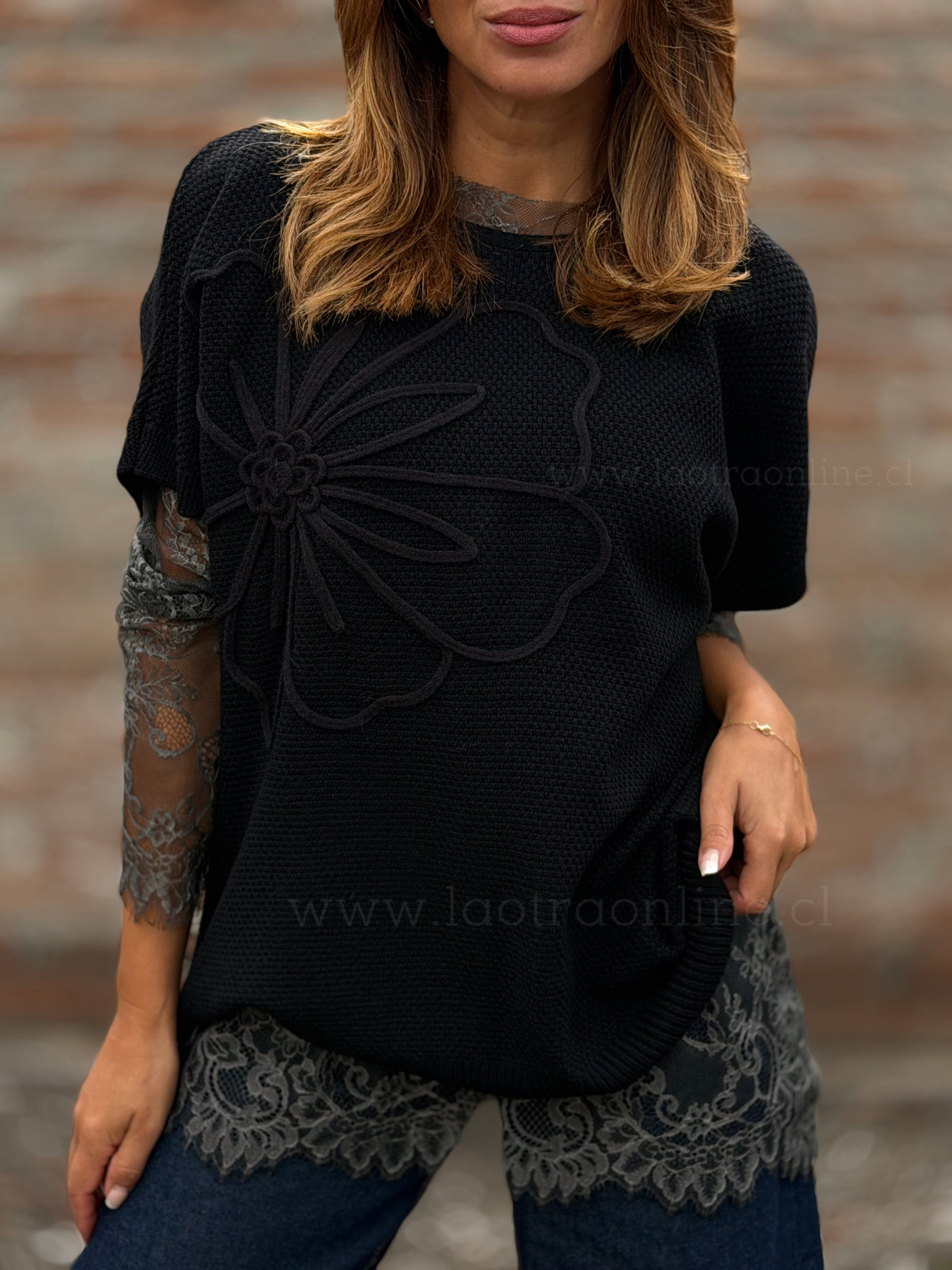 Sweater sin mangas flor negro