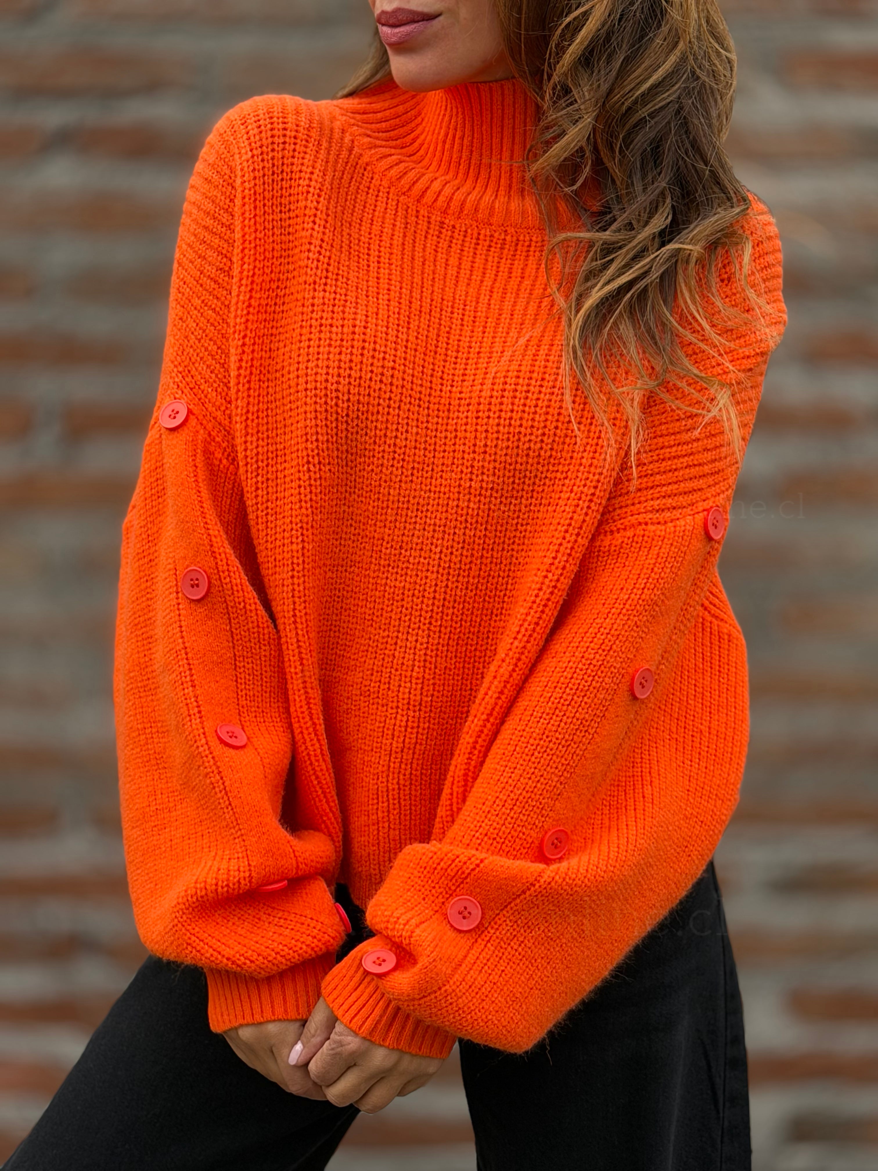 Sweater manga botón naranja