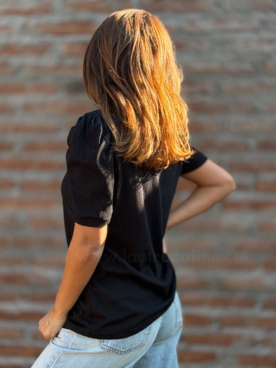 Polera manga abullonada negro