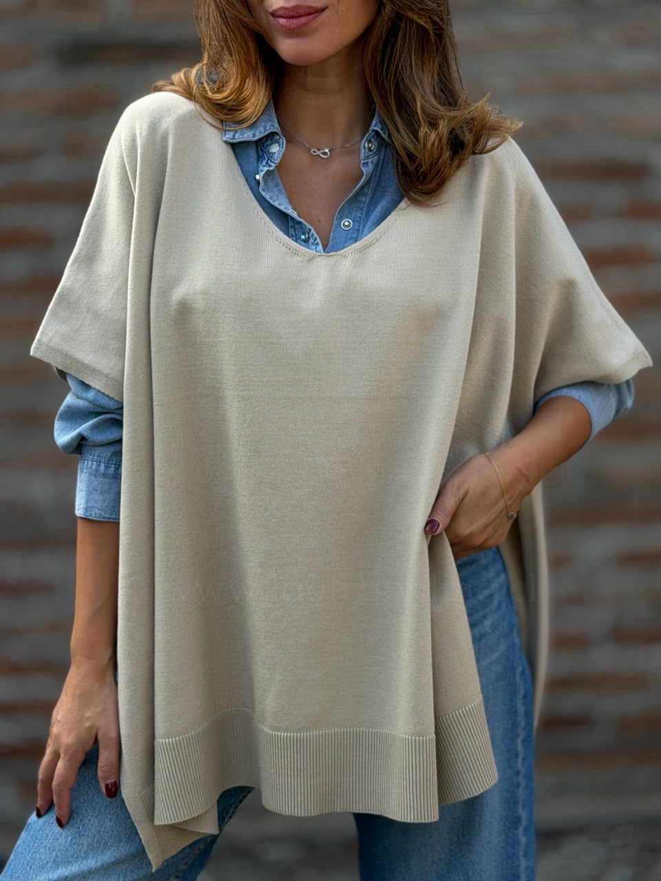 Sweater/poncho Isla arena